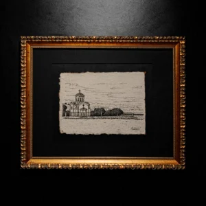 A black ink drawing of a domed chapel on textured handmade paper with deckled edges, mounted in an ornate gold frame.