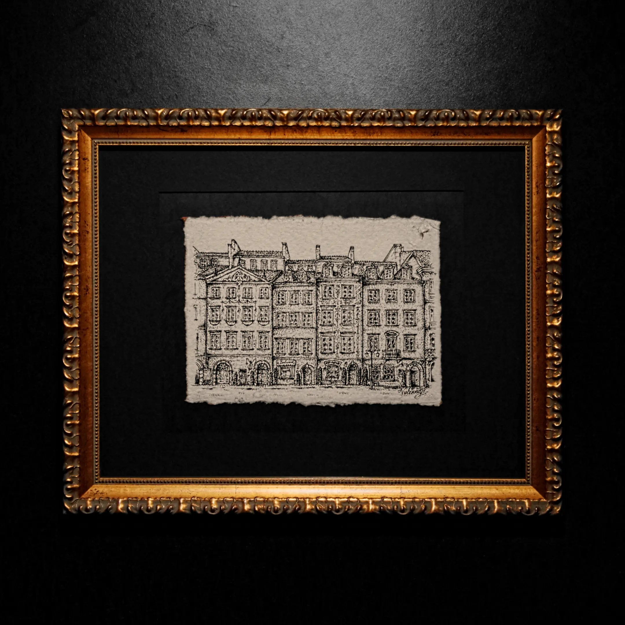 An ink cityscape sketch on deckle-edged paper, mounted in a black mat and enclosed within an ornate gold-leaf classical frame.