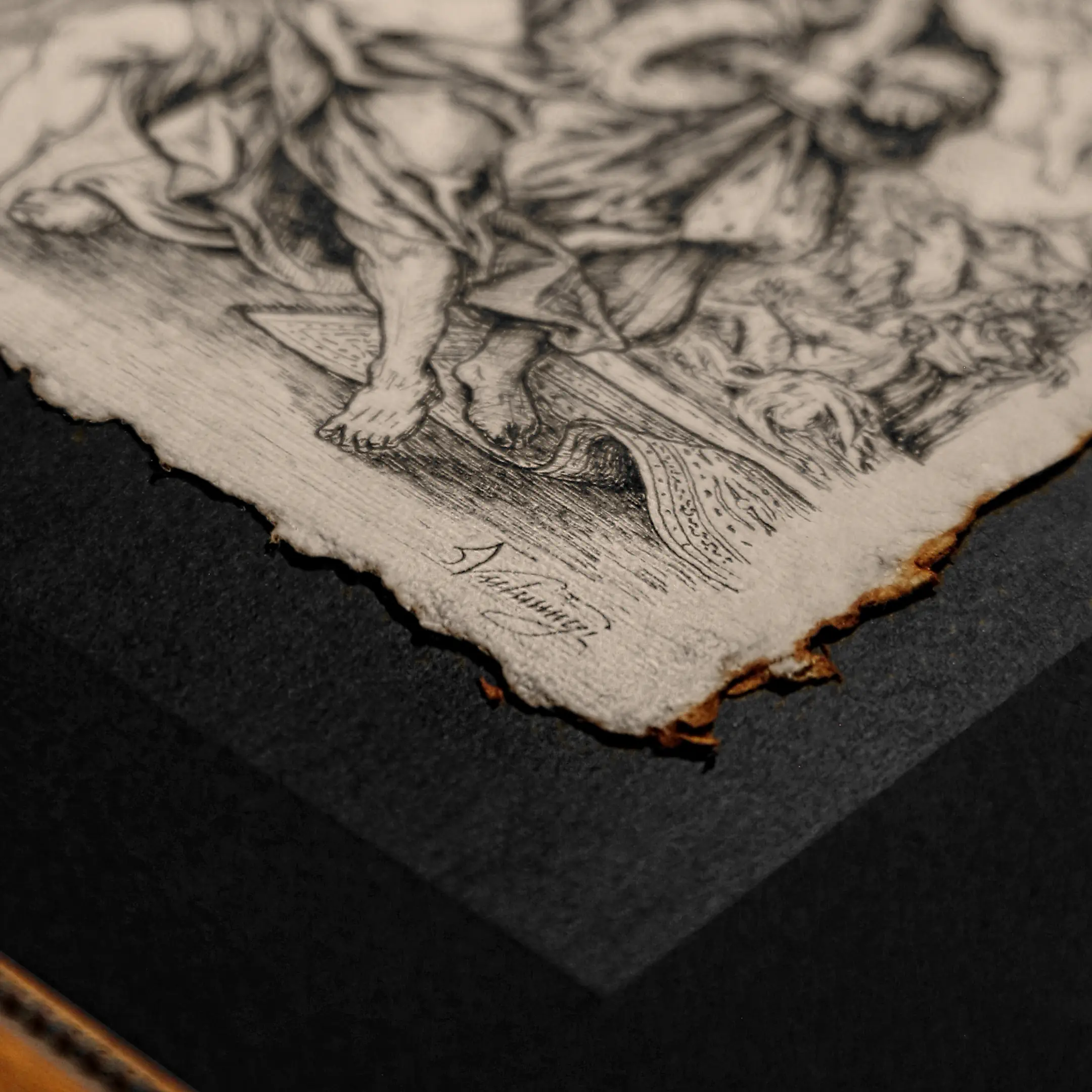 A close-up of the bottom right corner of a Vselenskyi ink illustration on textured paper. The focus is on the clear, calligraphic author signature "Vselenskyi" in ink. The deckled edge of the paper is visible. No part of the drawing is shown.