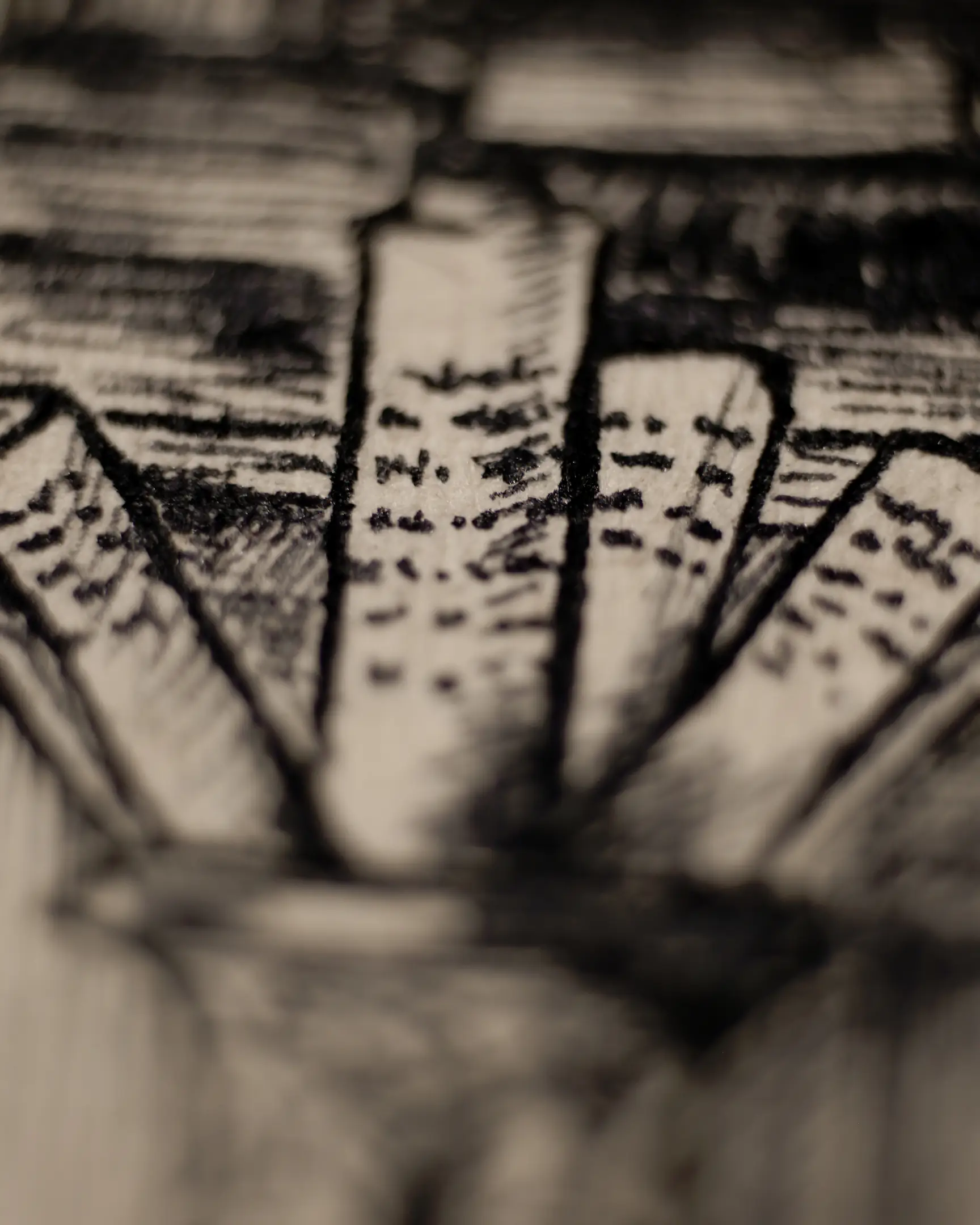 This close-up captures the intricate ink work and the physical depth of the strokes. The books represent the "light of knowledge" that the protagonist strives for—a stark contrast to the indifference of the elite. The play of focus draws the viewer's eye to the density of the lines, emphasizing that knowledge is a hard-won and solid foundation.