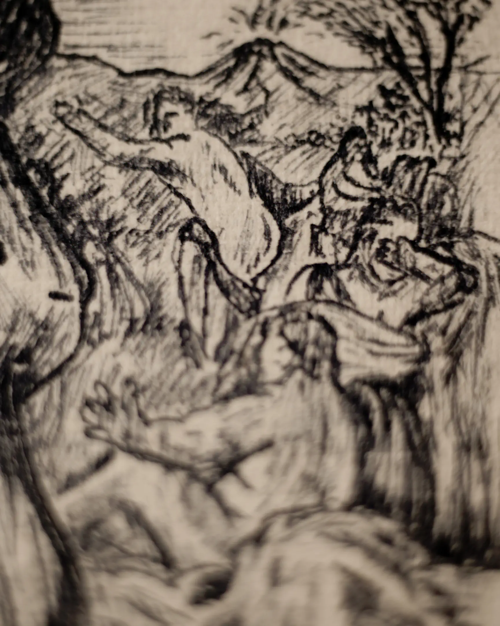 This close-up captures a group of figures rendered with energetic ink strokes. In the foreground, a figure is seen from behind with an outstretched arm. Above and to the right, other smaller figures appear to be moving or interacting within a landscape that includes rolling hills, a distant peak, and a stylized tree. The work uses dense hatching to create form and depth on the textured surface.