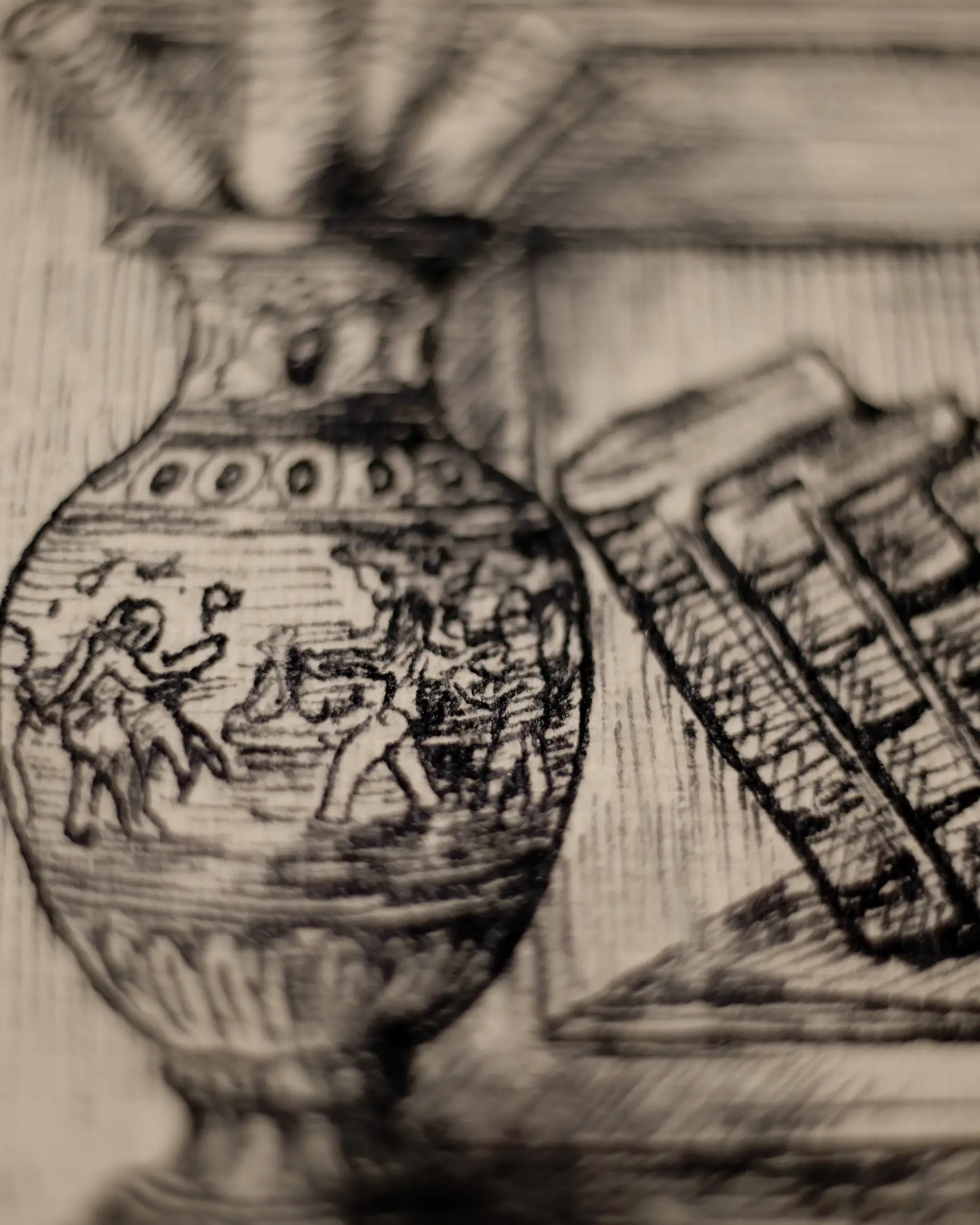 This fragment features a large, decorated vase as the focal point. The body of the vase is adorned with small figures engaged in action, reminiscent of classical Greek pottery. To the right of the vase, a stack of books is visible, leaning against a surface. The background and objects are defined by meticulous vertical and diagonal hatching, creating a sense of weight and historical atmosphere.