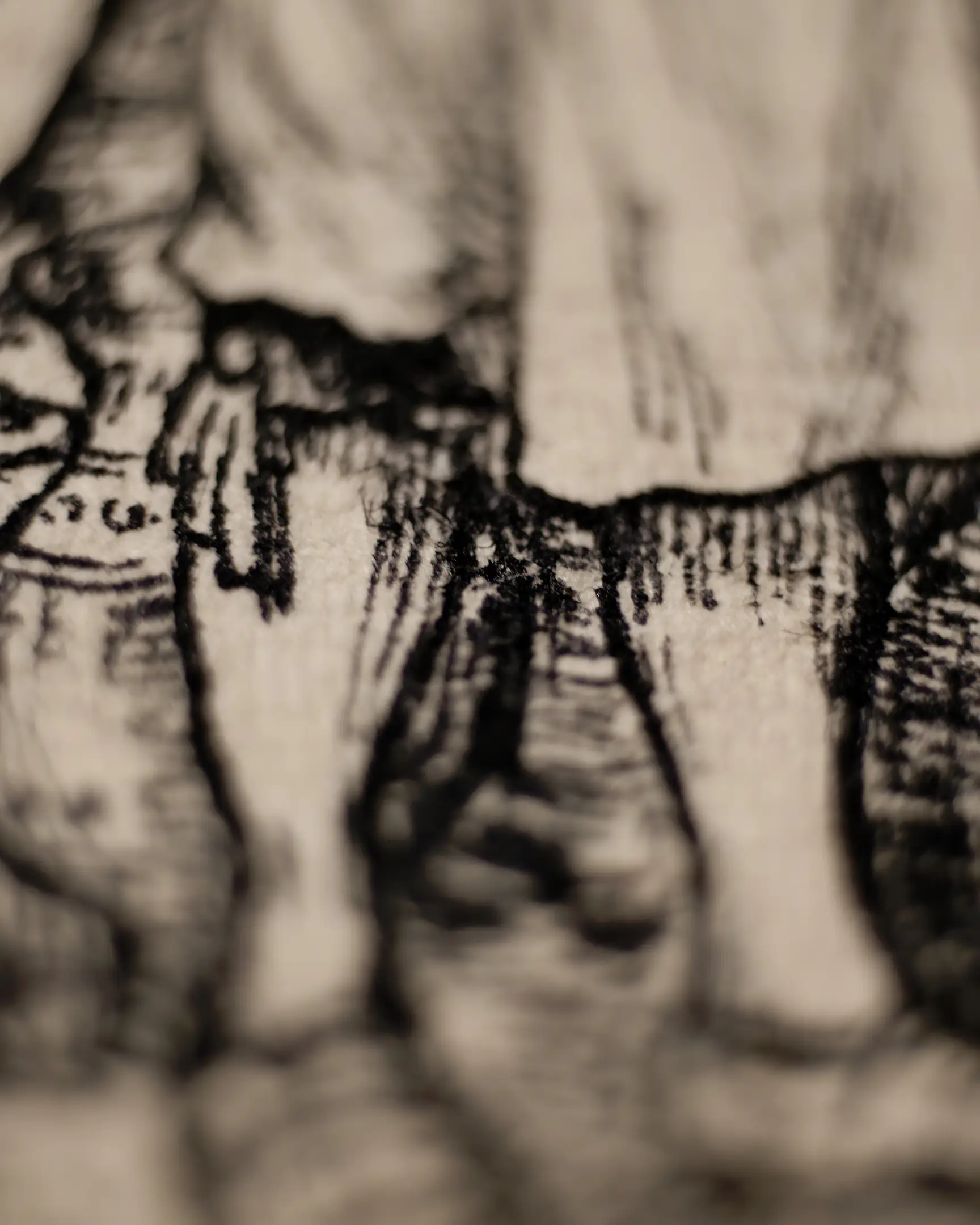 This shot captures the soul of the VSELÉNSKYI process. The shallow depth of field isolates the rhythmic ink strokes, revealing how the pigment settles into the natural valleys of the paper. It highlights the uncompromising quality of using historical tools—a level of detail that only becomes visible upon the closest inspection.