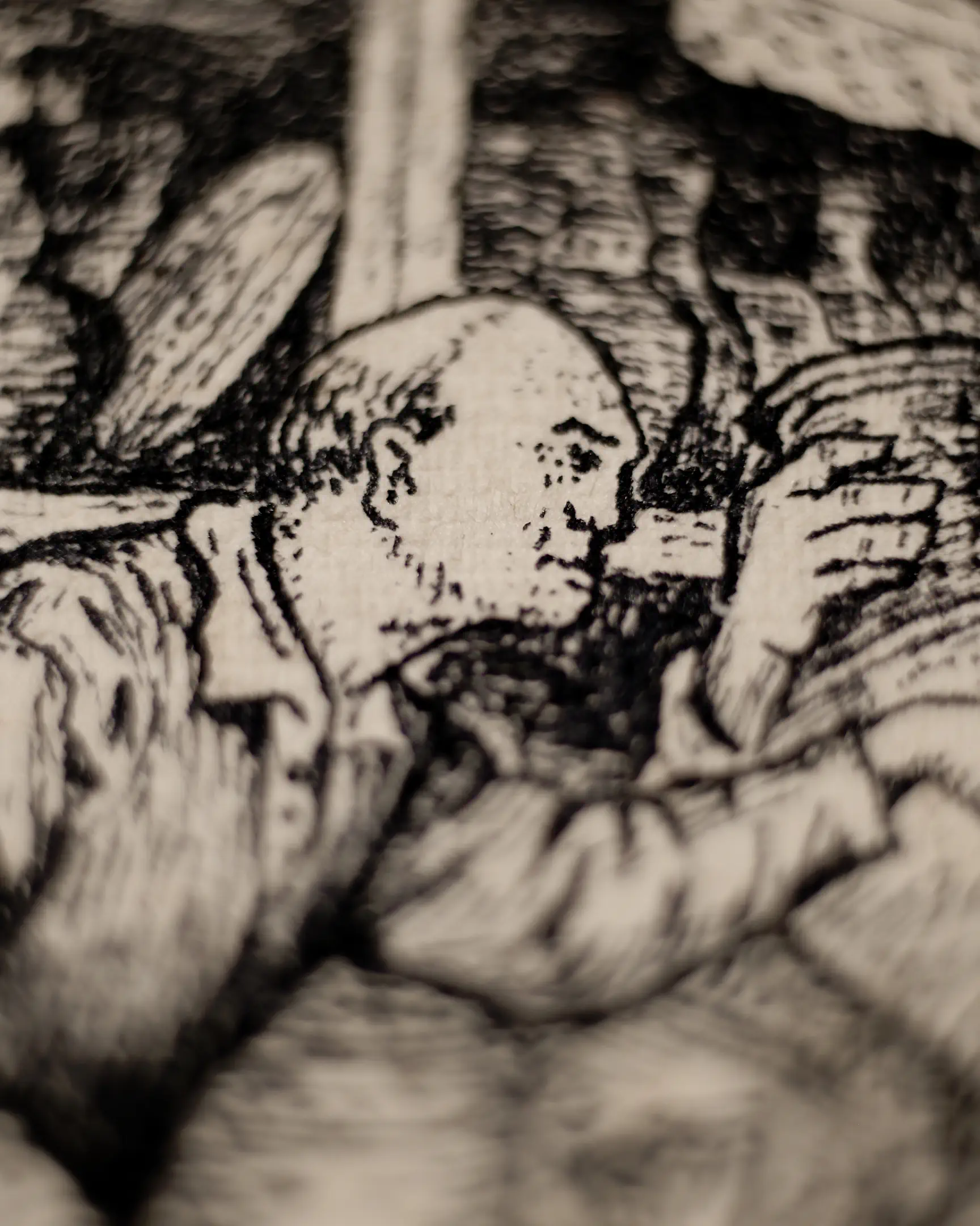 Macro ink detail by Vselenskyi: an elderly man with a sharp, questioning gaze, showcasing exhaustive minute details and archival ink texture.